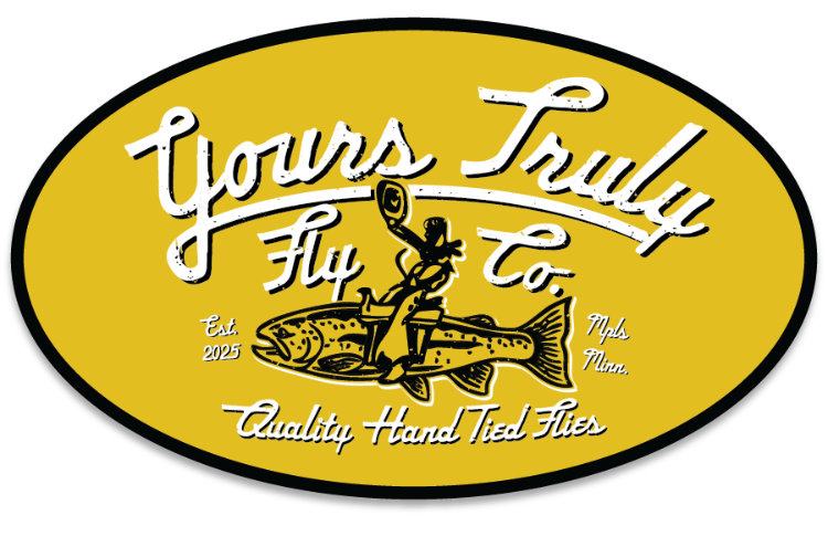 Oval-shaped logo for 'Your's Truly Fly Co.' with a fish and text on a yellow background